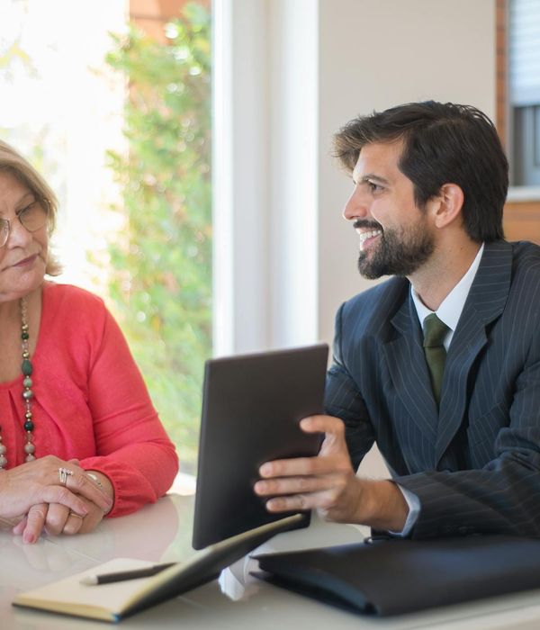 Man financial expert in suit presenting investment strategies with confident demeanor
