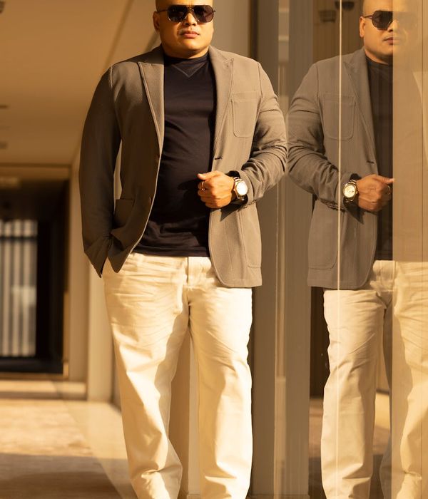 Man investment professional in smart casual attire with approachable expression