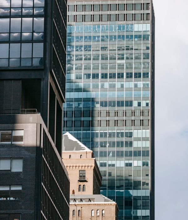 Modern investment academy building exterior with contemporary architecture and glass facades