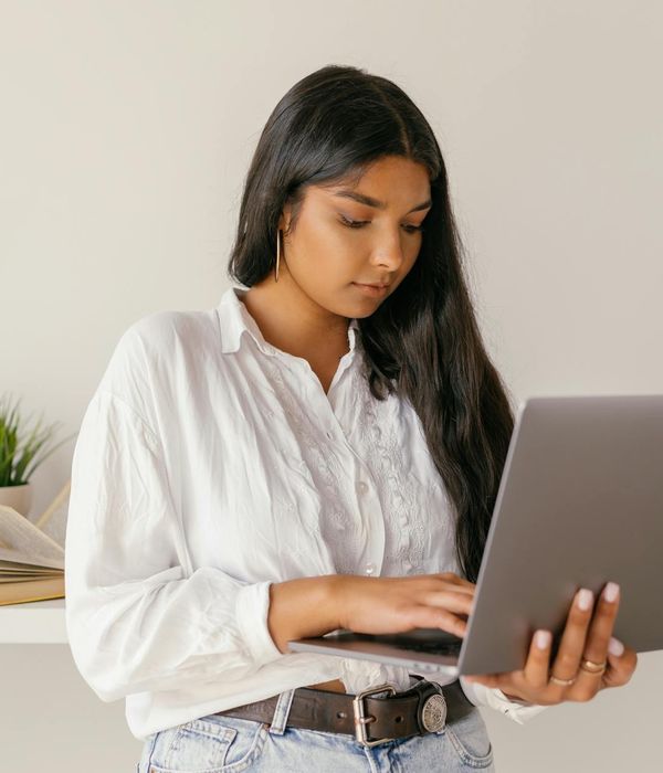 Young professional studying market analysis through interactive online education platform